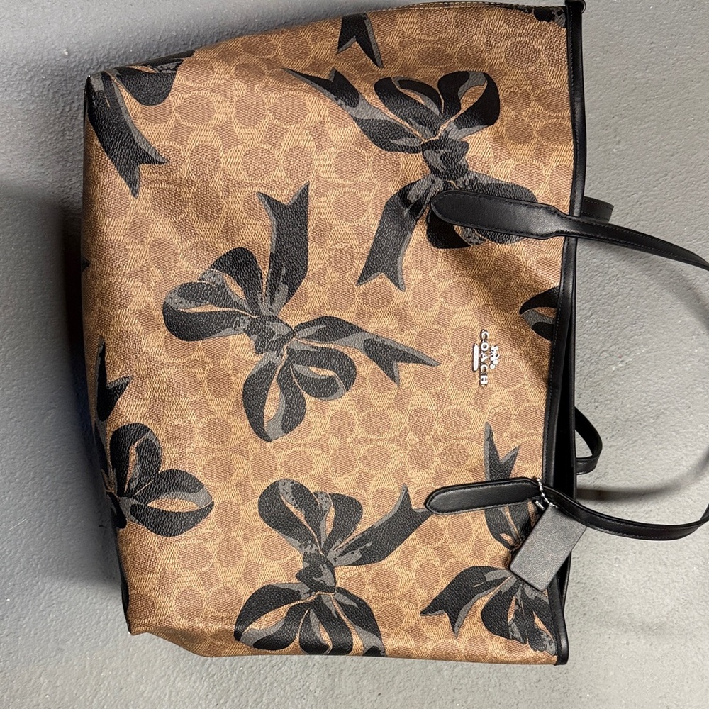 Coach Brown Signature Tote with Black Bow Print